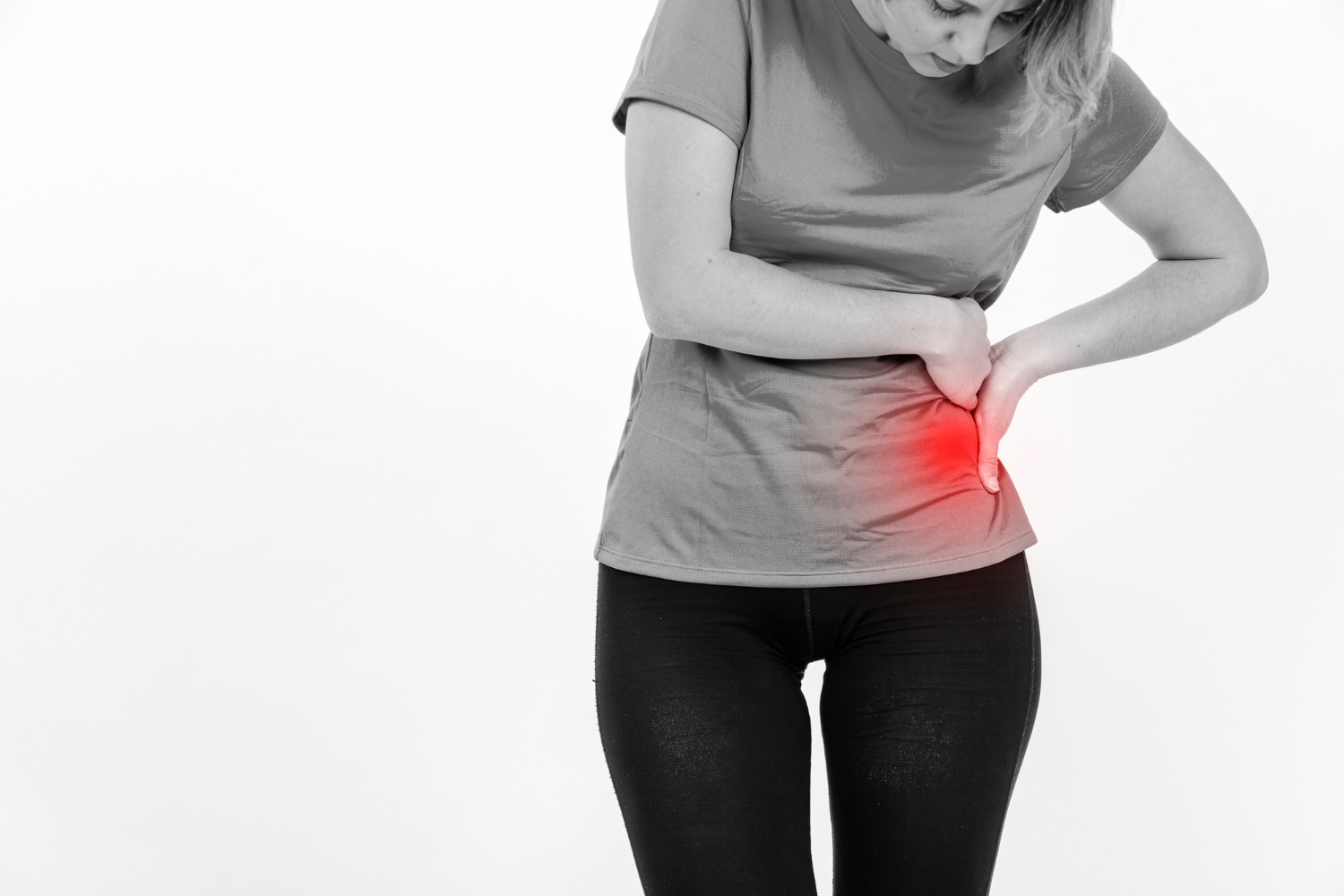 A woman having pain due to Hernia, tips on how to reduce risk of developing Hernia